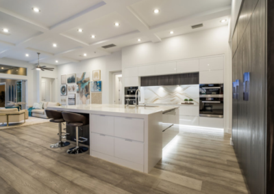 Contemporary kitchen with white island