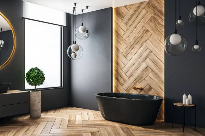 Black tub with wood wall accent