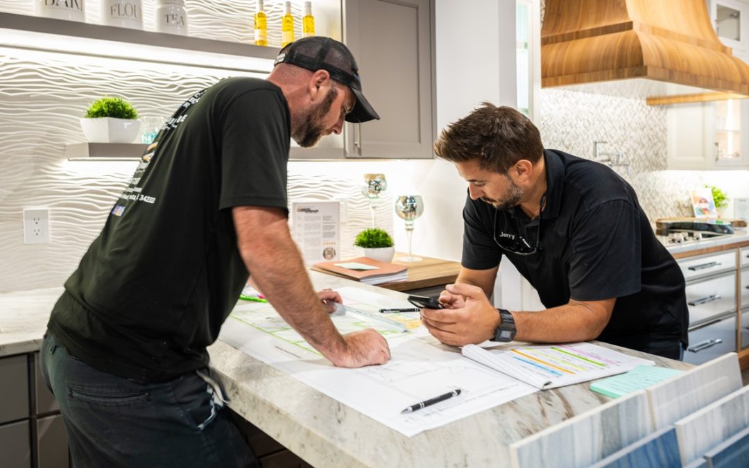 Two men looking over home plans