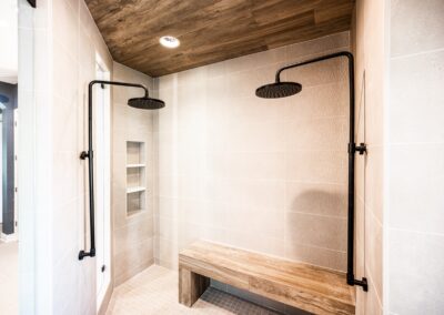 Shower with wood ceiling and two showerheads