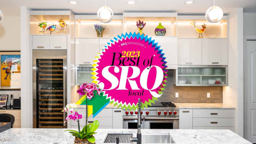Pink badge and white kitchen cabinets